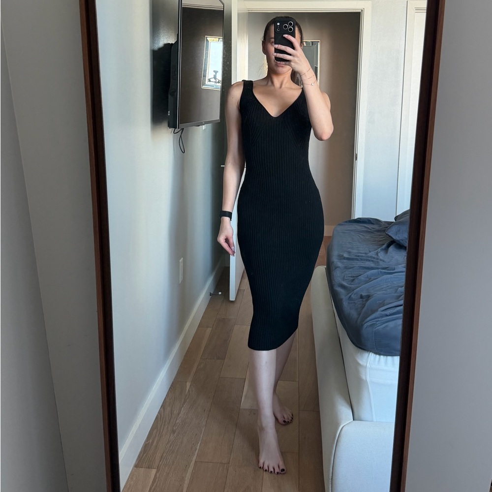 Knitted black dress with open back  S-M